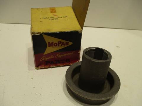 Reverse servo piston